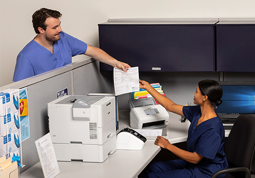Healthcare workers exchanging information